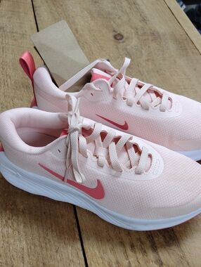 Nike Women's Light Pink Athletic Sneakers with Coral Swoosh
